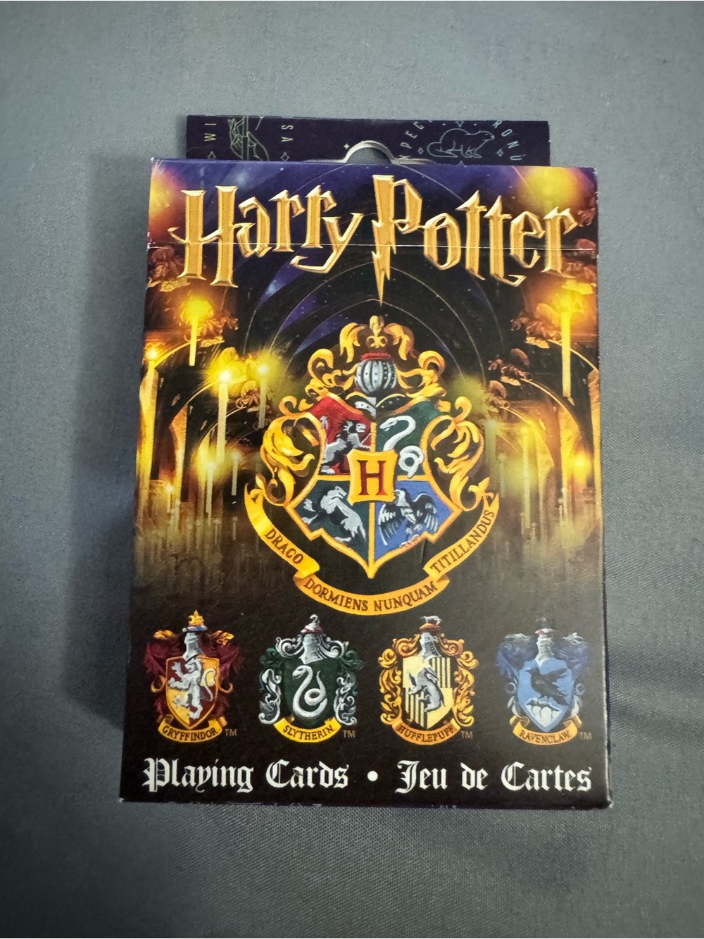 Warner Bros. Harry Potter Playing Cards - Black & Gold with Multi-House Accents